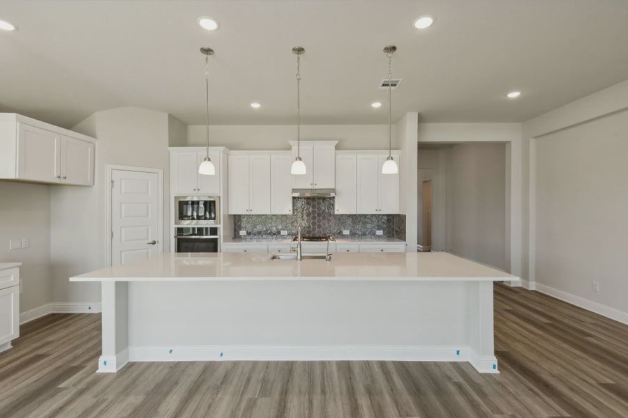 Representative furnished interior of a home built from the Raleigh by Chesmar Homes in Oaks of North Grove, Waxahachie (Image 5).