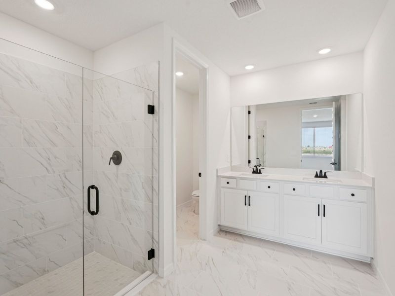 Furnished interior view inside a new home in Oakfield Trails - Signature Series, Parrish (Image 7). Furnished interior view inside a new home in Oakfield Trails - Signature Series, Parrish (Image 7).