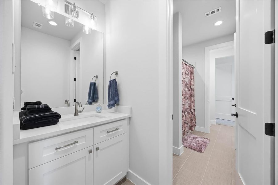 Furnished interior view inside a new home in Artavia, Conroe (Image 18).