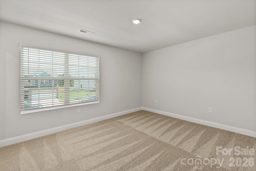 Spacious, unfurnished interior of a new home in Ascot Woods, Charlotte (Image 12).