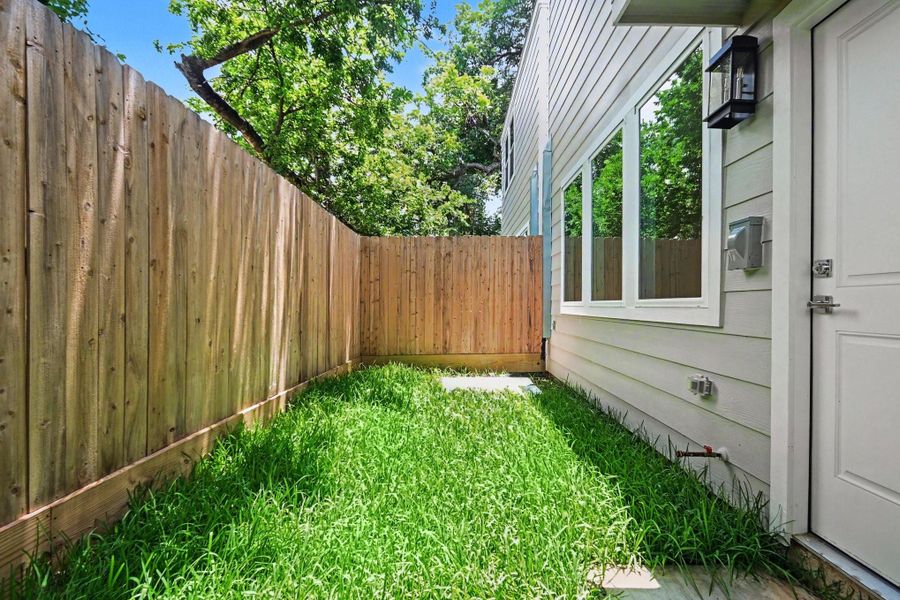 Exterior details and patio area of a home in , Houston (Image 2). Exterior details and patio area of a home in , Houston (Image 2).