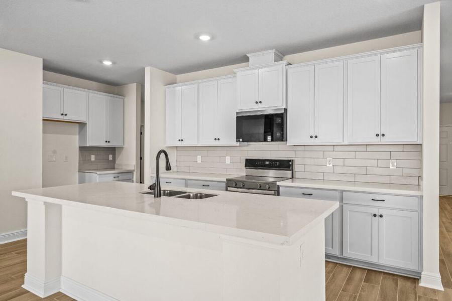 Furnished interior view inside a new home in Natureview, Freeport (Image 6).