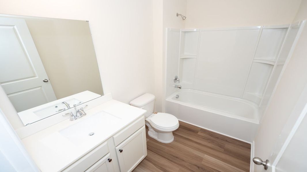 Representative furnished interior of a home built from the CALI by D.R. Horton in Lochaven, Conway (Image 4).