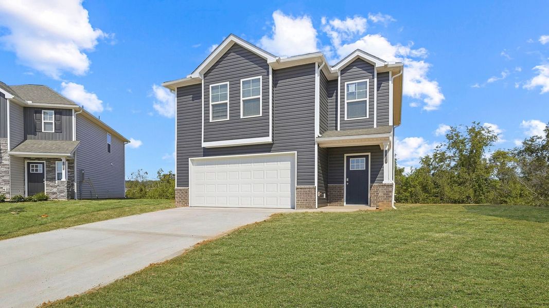 Front exterior of a new home in Johnson Farms, Greeneville, TN, highlighting curb appeal (Image 2).