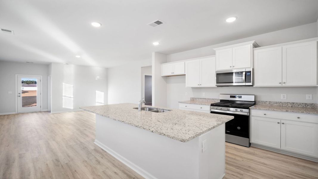 Furnished interior view inside a new home in Grand Oaks, Columbia (Image 14). Furnished interior view inside a new home in Grand Oaks, Columbia (Image 14).