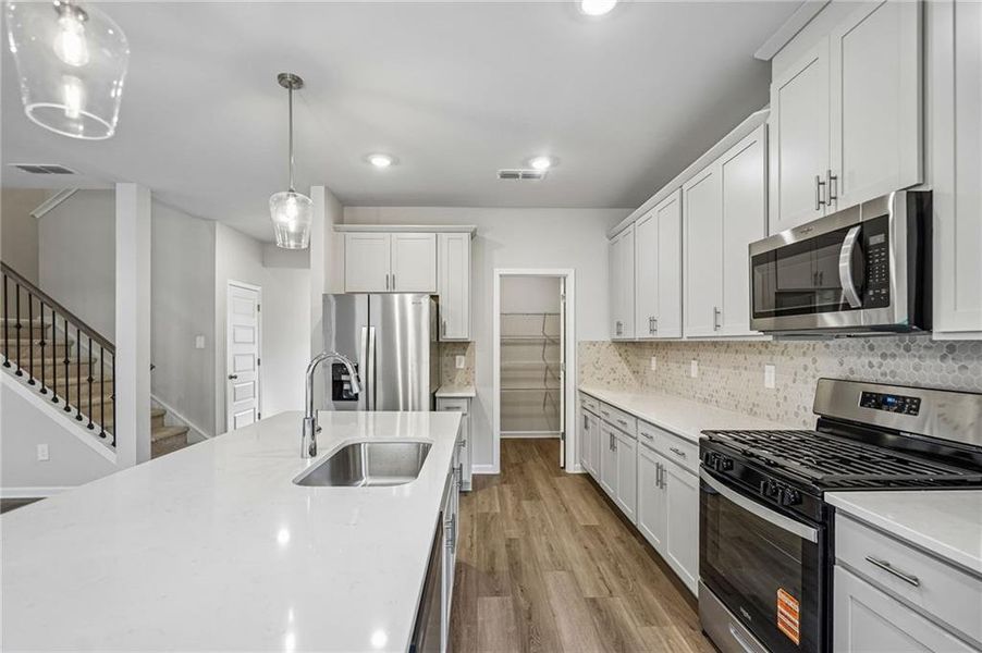 Furnished interior view inside a new home in Martin Springs - Estate Series, Lawrenceville (Image 11).