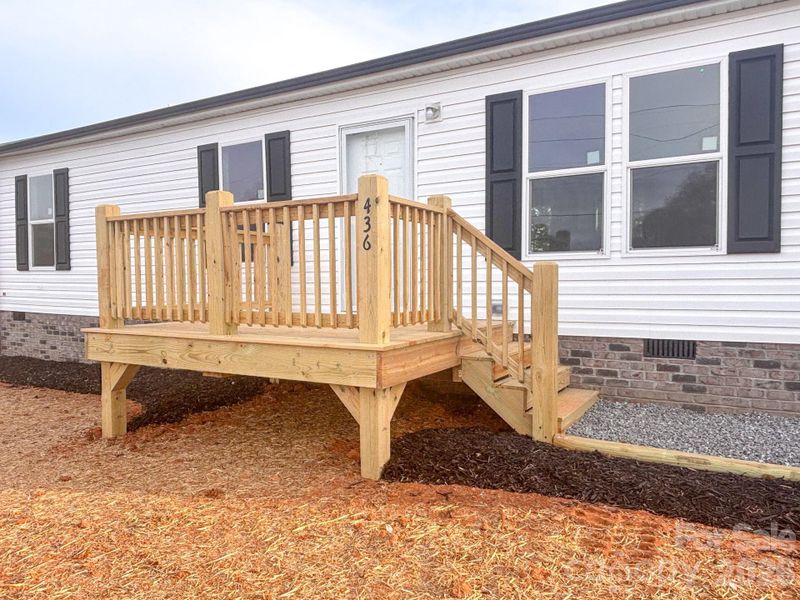 Exterior details and patio area of a home in , Lenoir (Image 13).