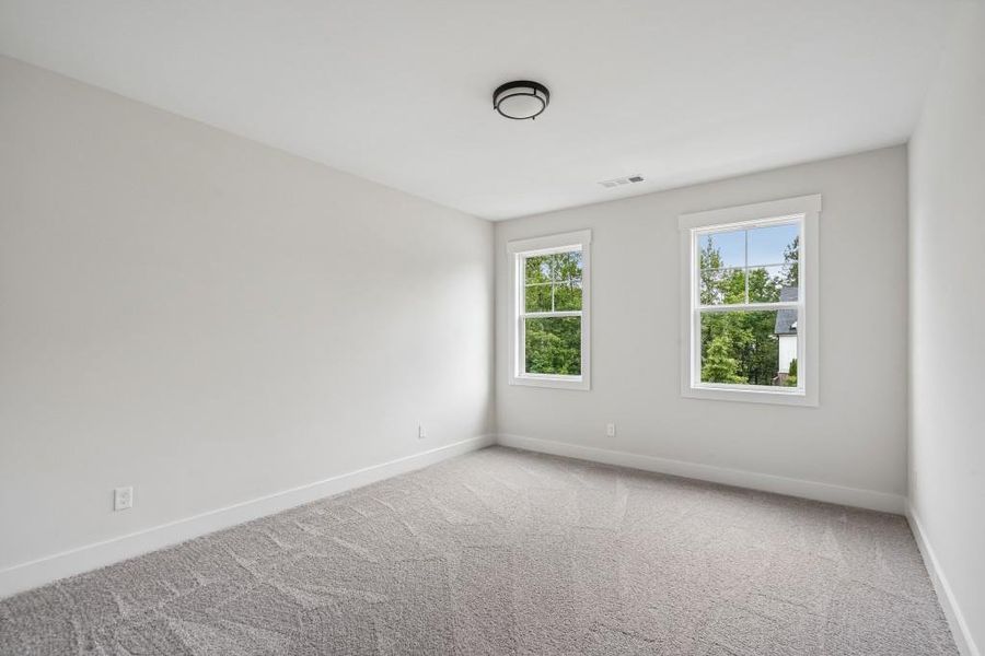Spacious, unfurnished interior of a new home in Arden on Lanier, Cumming (Image 28).