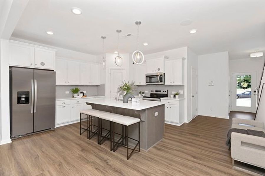 Representative furnished interior of a home built from the Alexandria TH by True Homes in Covington Ridge Townhomes, Thomasville (Image 5).