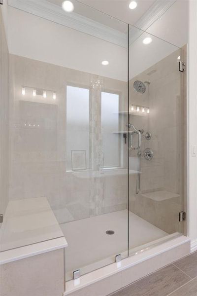 Full bathroom featuring a stall shower, crown molding, and recessed lighting Full bathroom featuring a stall shower, crown molding, and recessed lighting