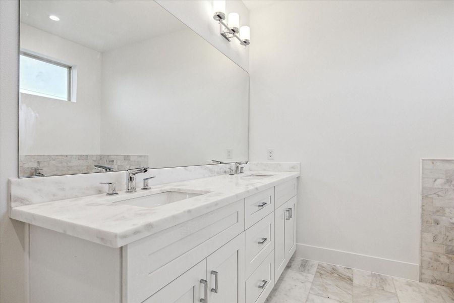 Marble Counters * Lots of Cabinets and Drawers.