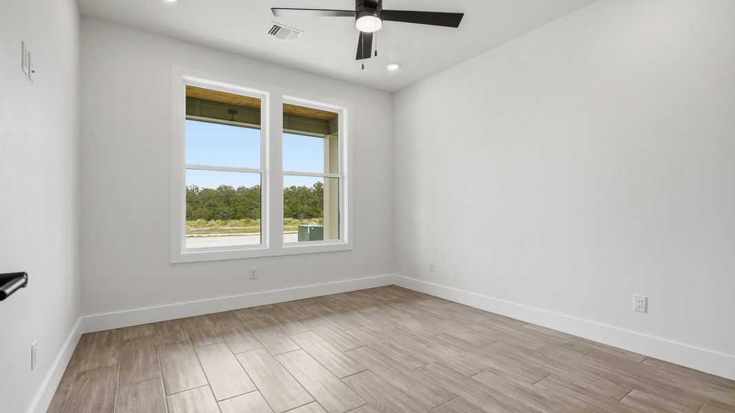 Spacious, unfurnished interior of a new home in Lakeside at Millican Reserve, College Station (Image 31).