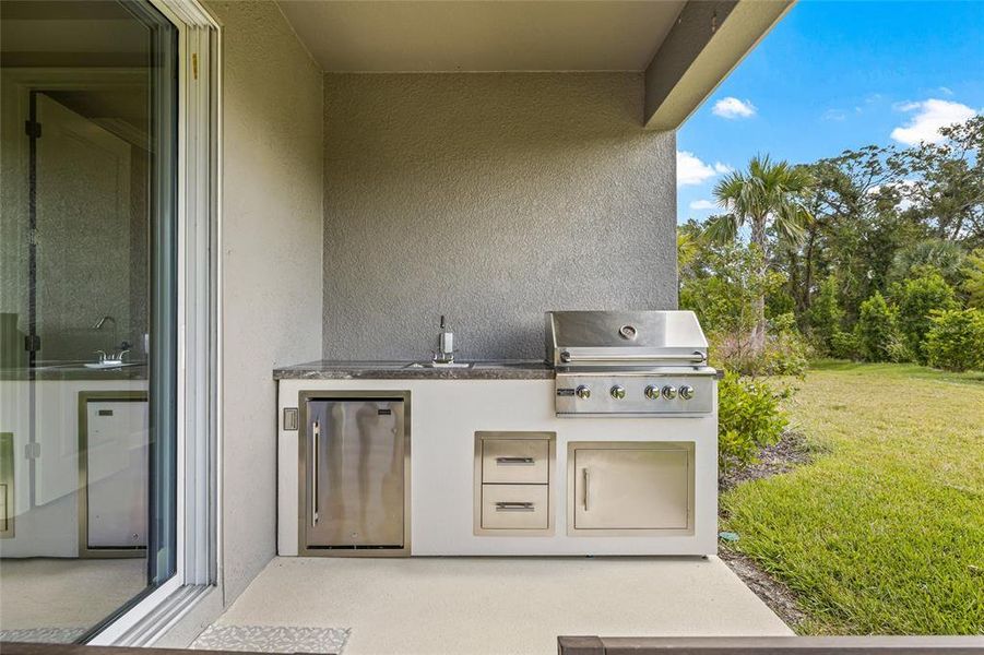 Exterior details and patio area of a home in Tiburon, Nokomis (Image 24).