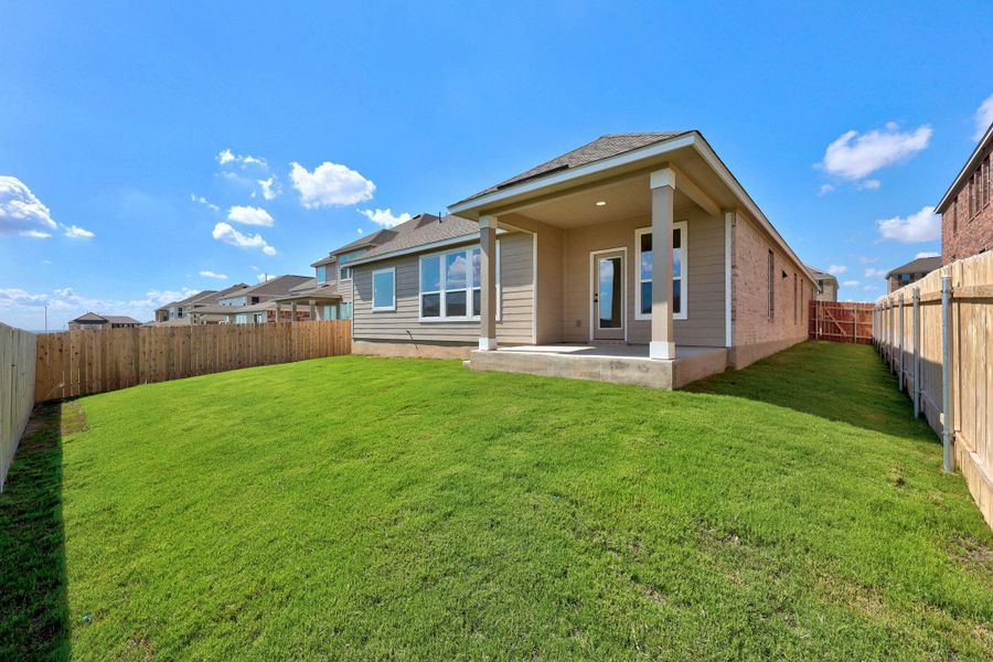 Exterior details and patio area of a home in Salerno - Classic Collection, Round Rock (Image 18).