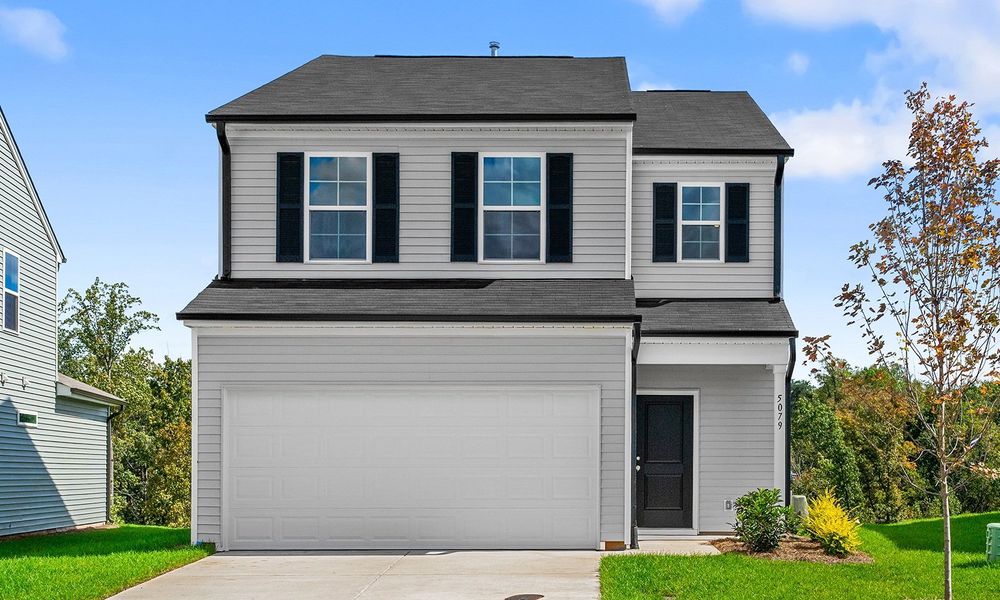 Front exterior of a new home in Bell West, Kernersville, NC, highlighting curb appeal (Image 1).