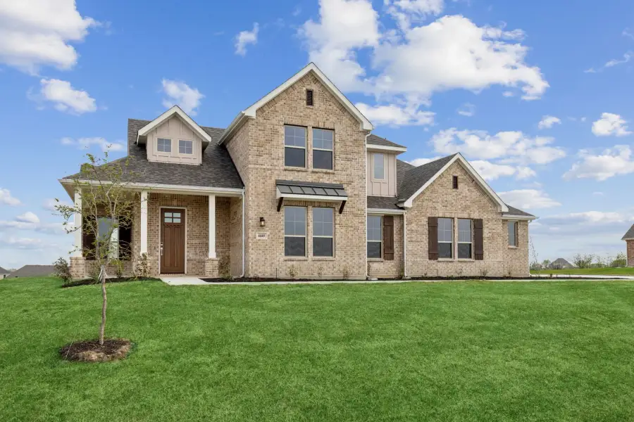 Representative exterior photo of a completed home built from the Yukon by Centre Living Homes in Ellis Ranch Estates, Waxahachie, TX (Image 2).