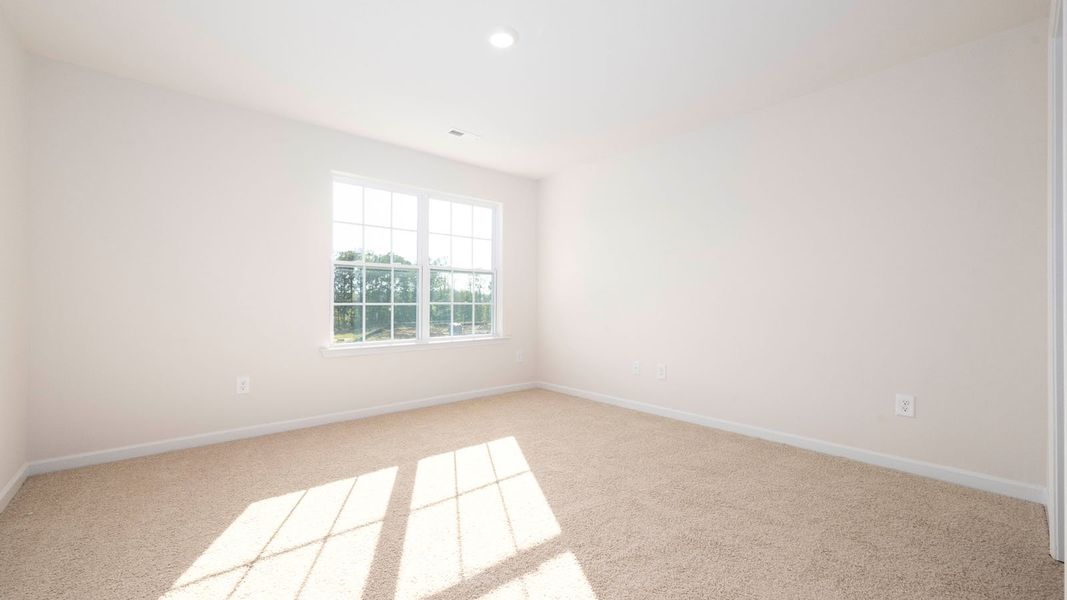 Spacious, unfurnished interior of a new home in North Village Townes, Greensboro (Image 19).