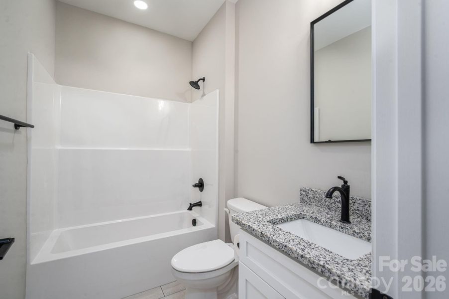 Furnished interior view inside a new home in , Vale (Image 7).