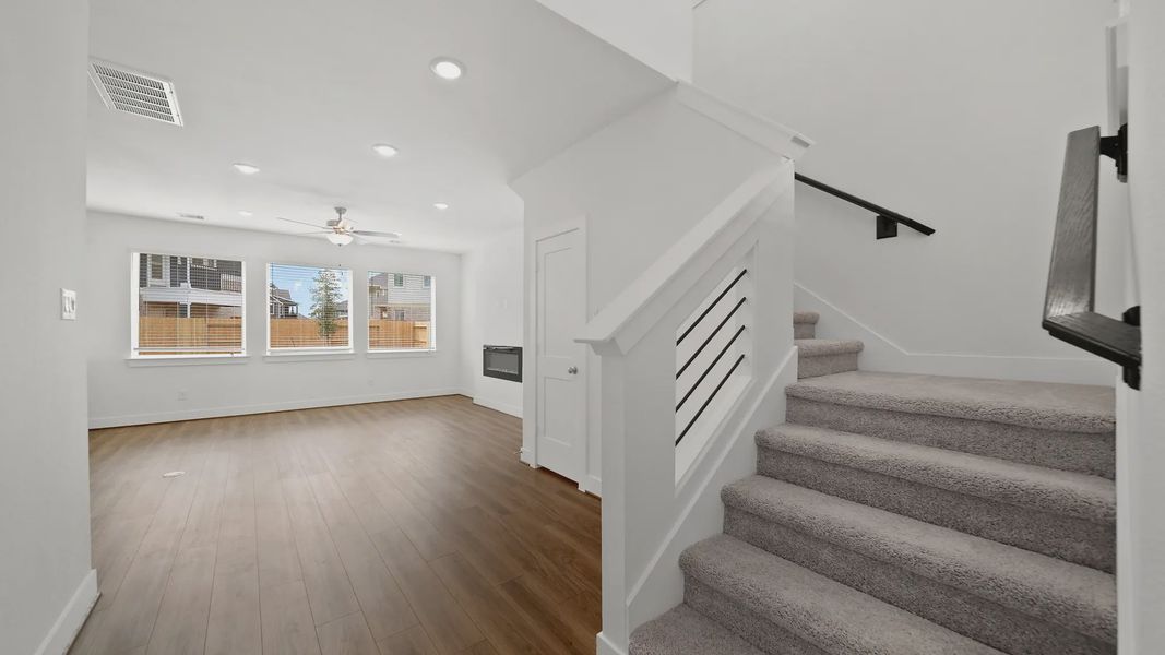 Representative unfurnished interior of a home built from the Rosewood by Chesmar Homes in Sienna Courtyard, Missouri City (Image 9).