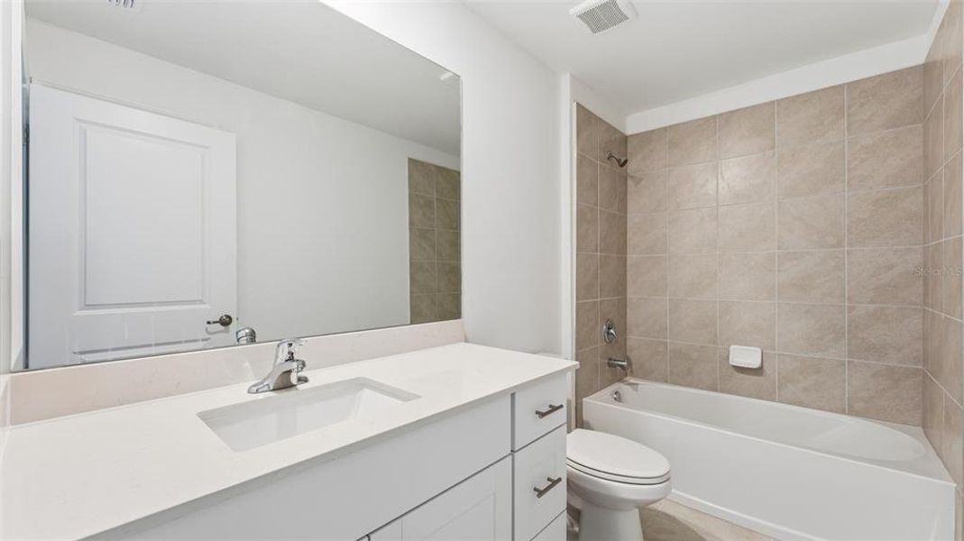 Furnished interior view inside a new home in Rotonda Lakes, Rotonda West (Image 6).