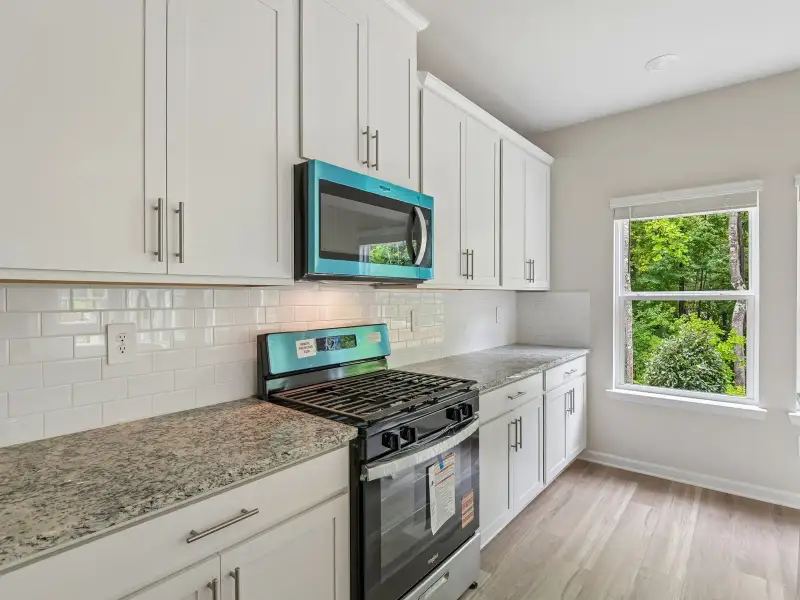 Furnished interior view inside a new home in Harmony Manor, Fairburn (Image 5).