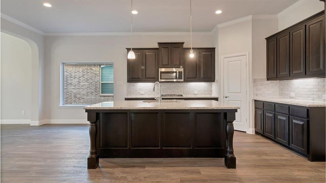 Kitchen - All Home and community information, including pricing, included features, terms, availability and amenities, are subject to change at any time without notice or obligation. All Drawings, pictures, photographs, video, square footages, floor plans, elevations, features, colors and sizes are approximate for illustration purposes only and will vary from the homes as built.