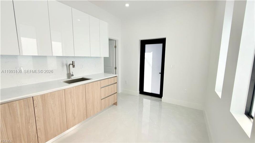 Furnished interior view inside a new home in , Fort Myers (Image 11).