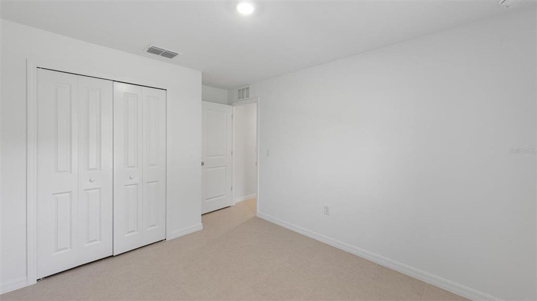 Spacious, unfurnished interior of a new home in , Port Charlotte (Image 12).