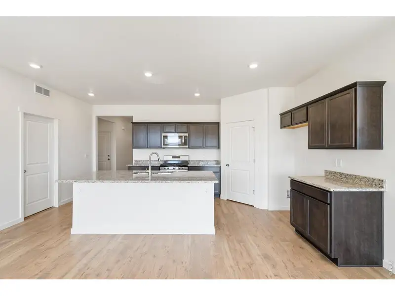 Furnished interior view inside a new home in Westgate, Greeley (Image 6).