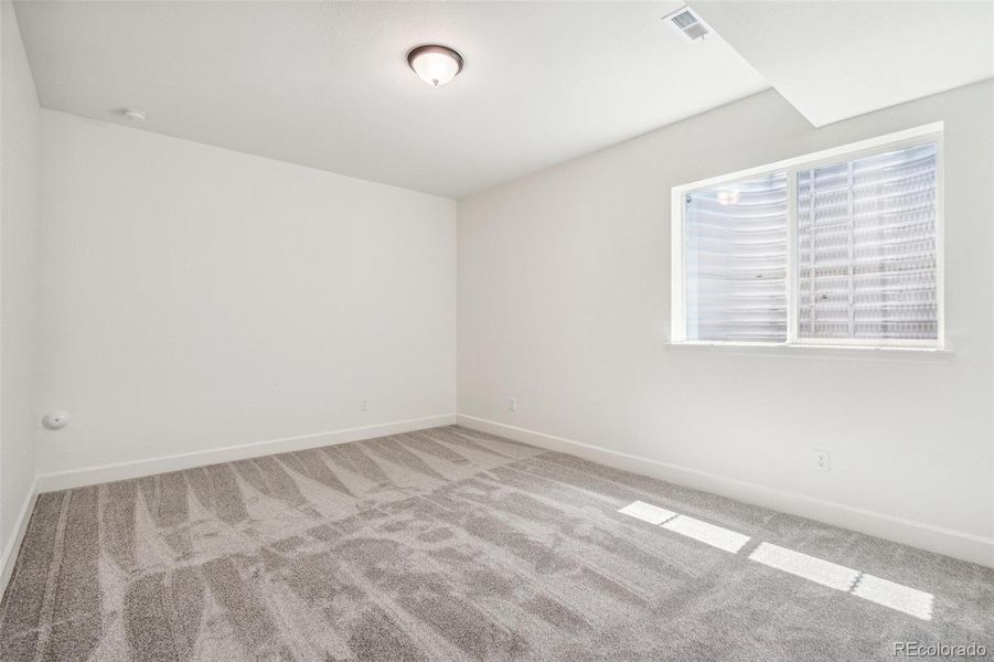 Spacious, unfurnished interior of a new home in Legato, Commerce City (Image 21).