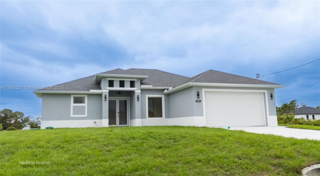 Front exterior of a new home in , Lehigh Acres, FL, highlighting curb appeal (Image 19).