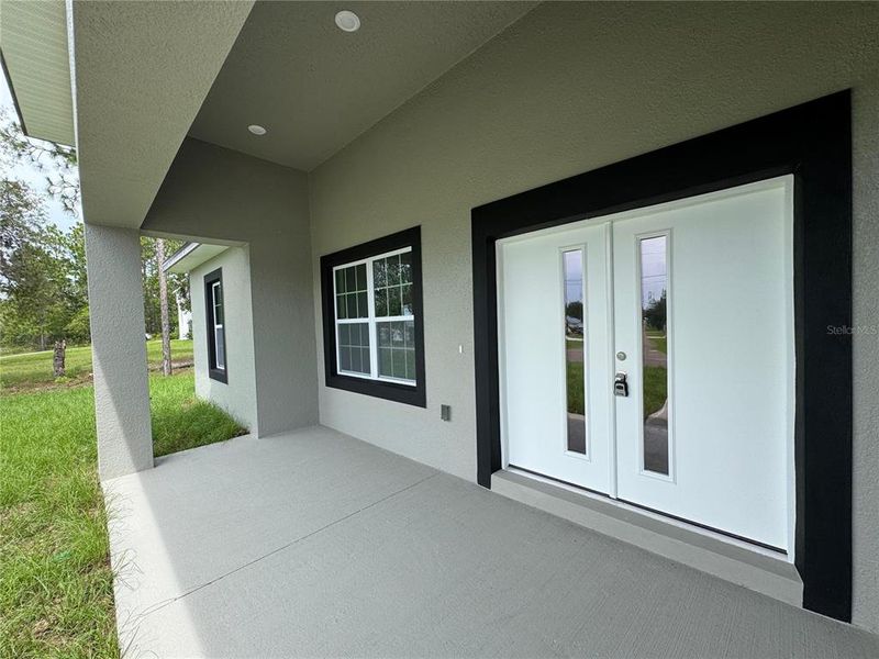 Exterior details and patio area of a home in , Citrus Springs (Image 29).
