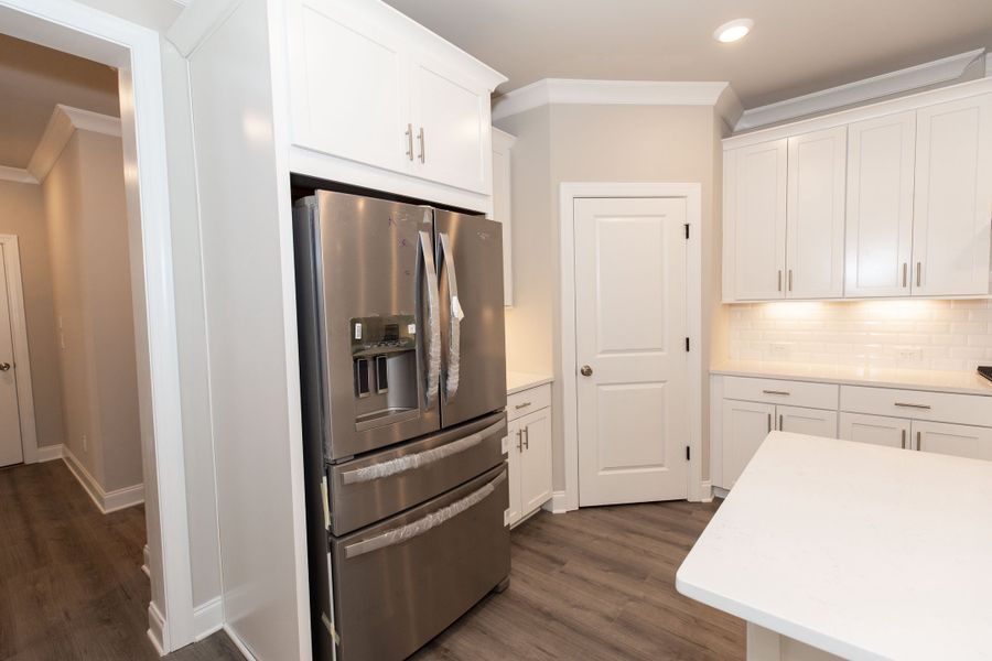 Representative furnished interior of a home built from the The Charleston by The Providence Group in Aberdeen, Hoschton (Image 9).