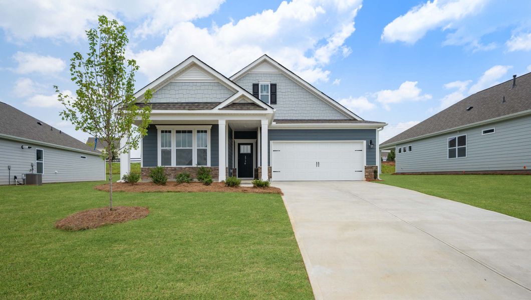 Front exterior of a new home in The Villas at Pine Valley, Boiling Springs, SC, highlighting curb appeal (Image 1).