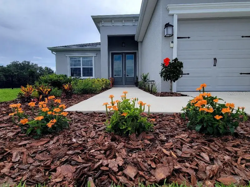 Exterior details and patio area of a home in , Parrish (Image 3).