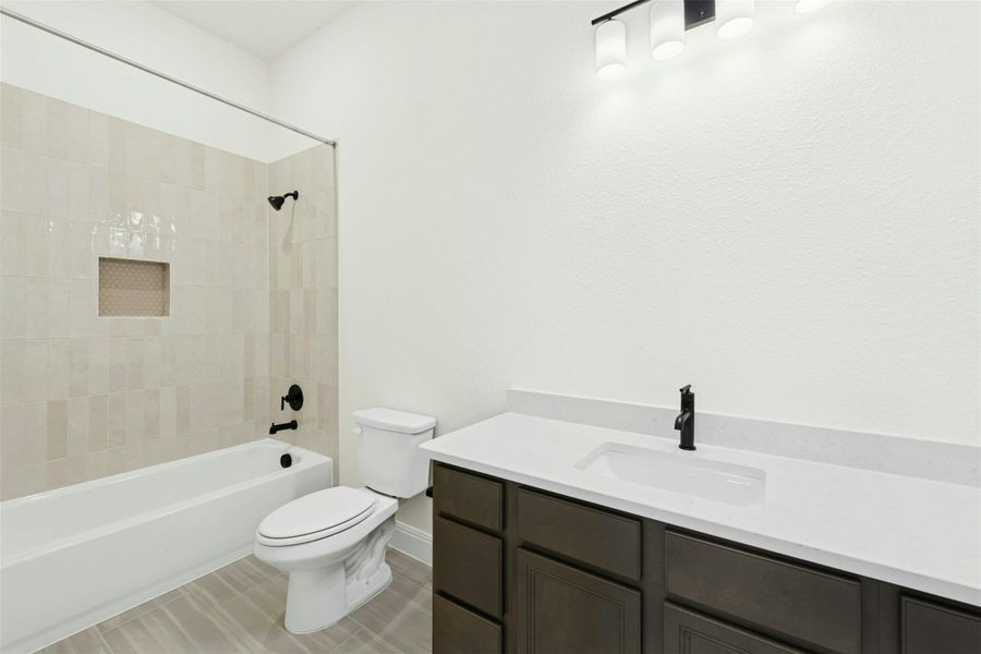 Full bath with vanity and bathing tub / shower combination