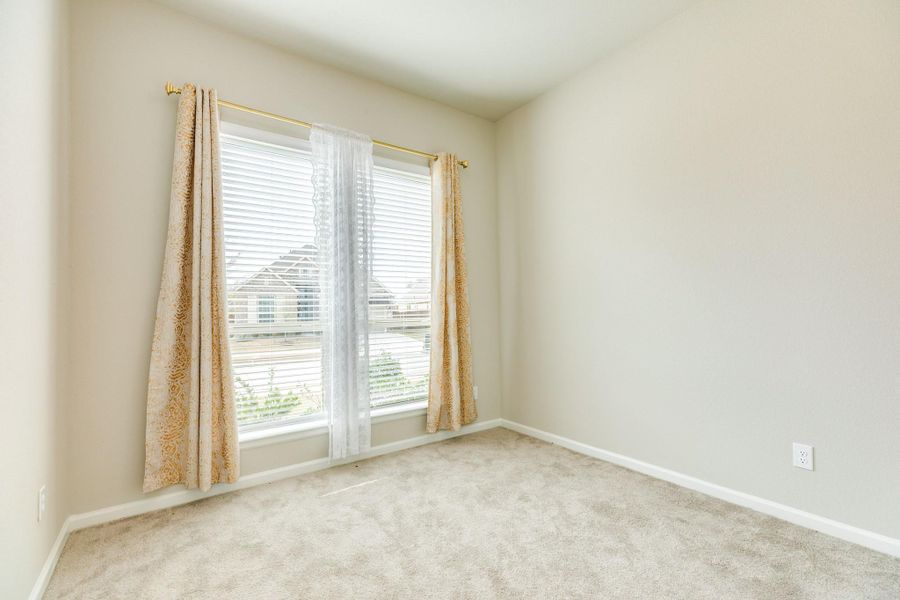 Guest ensuite is located at the front of the house and features a private bathroom. Guest ensuite is located at the front of the house and features a private bathroom.