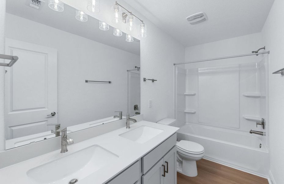 Furnished interior view inside a new home in Saddleback at Santa Rita Ranch, Liberty Hill (Image 4). Furnished interior view inside a new home in Saddleback at Santa Rita Ranch, Liberty Hill (Image 4).