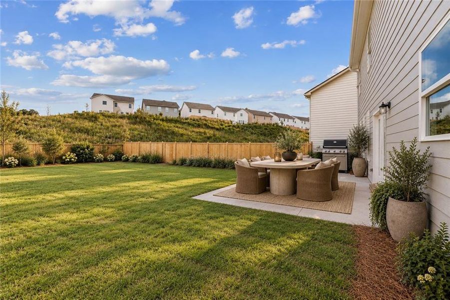 Exterior details and patio area of a home in Clark Farms, Flowery Branch (Image 3).
