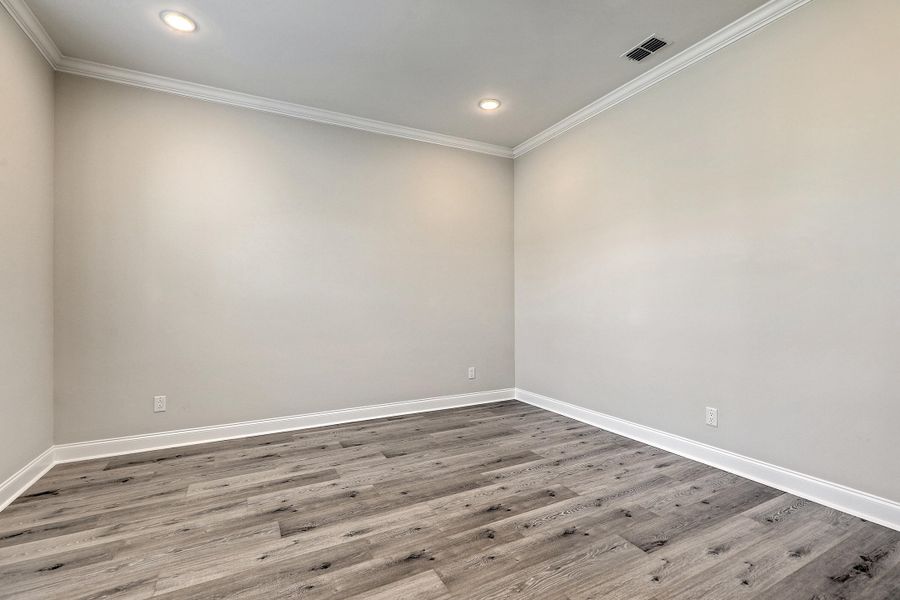 Spacious, unfurnished interior of a new home in K. Hovnanian's® Four Seasons at Lakes of Cane Bay, Summerville (Image 15).