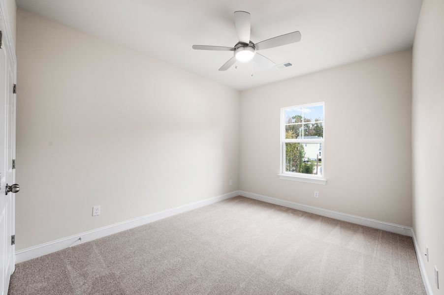 Representative unfurnished interior of a home built from the Ellis by Hunter Quinn Homes in Creek Pointe, Moncks Corner (Image 12).