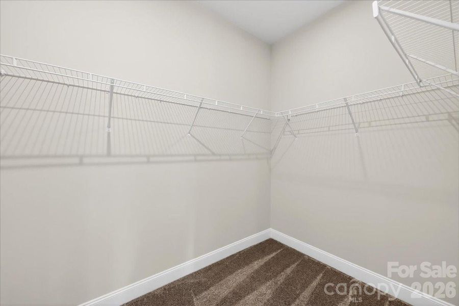 Primary walk-in closet