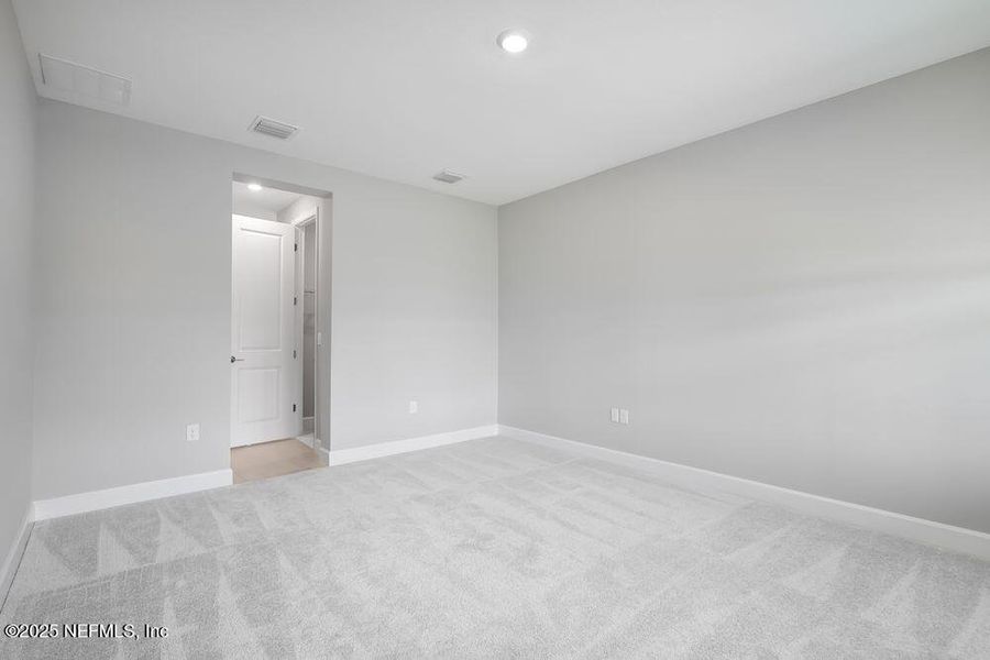 Spacious, unfurnished interior of a new home in Colbert Landings, Palm Coast (Image 17).