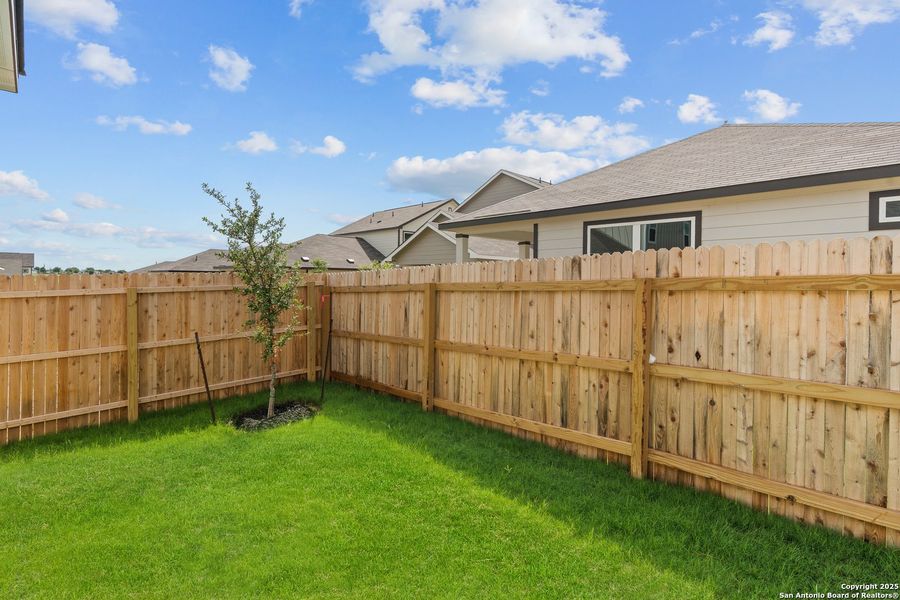 Front exterior of a new home in Highland Ridge, New Braunfels, TX, highlighting curb appeal (Image 20). Front exterior of a new home in Highland Ridge, New Braunfels, TX, highlighting curb appeal (Image 20).