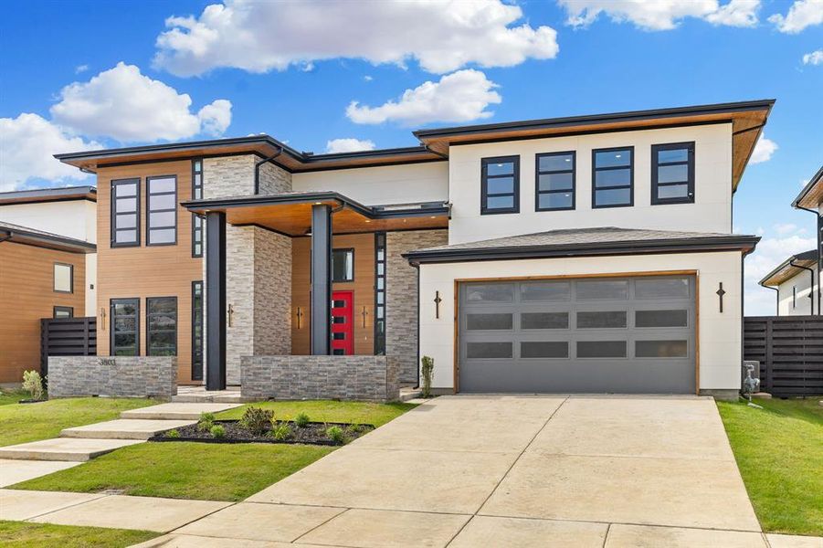 Front exterior of a new home in The Dawn, Melissa, TX, highlighting curb appeal (Image 2). Front exterior of a new home in The Dawn, Melissa, TX, highlighting curb appeal (Image 2).
