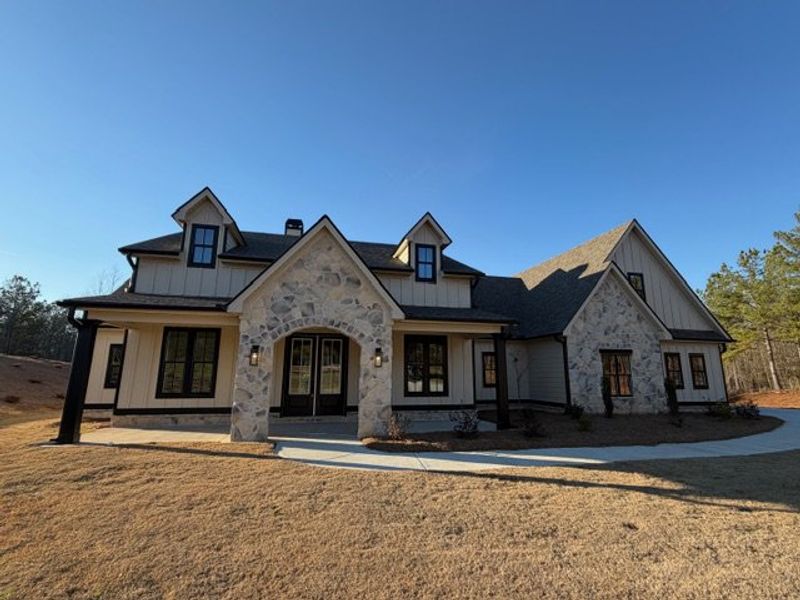 Front exterior of a new home in Harmon Springs, Carrollton, GA, highlighting curb appeal (Image 26).
