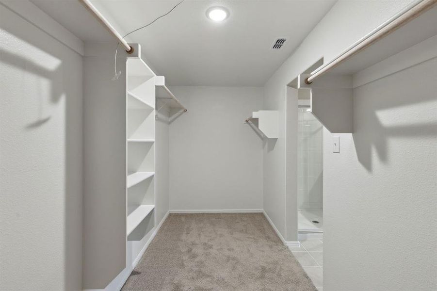 Primary Closet in the Harrison home plan by Trophy Signature Homes – REPRESENTATIVE PHOTO