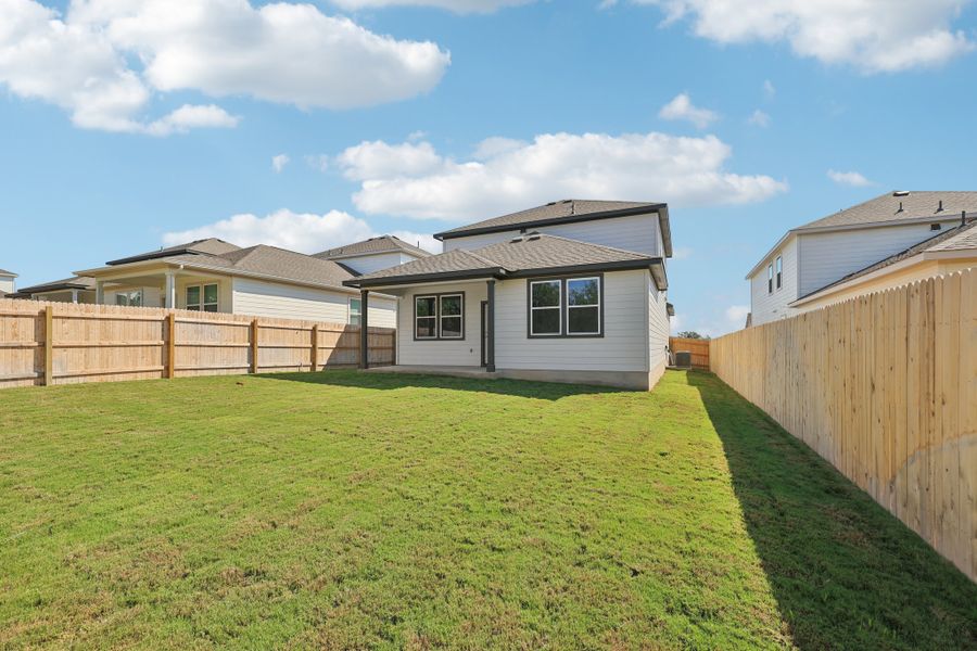 A house with a fence around it.