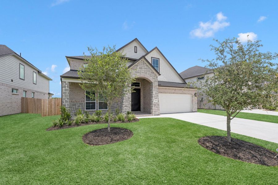 Front exterior of a new home in Briarwood Crossing, Rosenberg, TX, highlighting curb appeal (Image 1). Front exterior of a new home in Briarwood Crossing, Rosenberg, TX, highlighting curb appeal (Image 1).