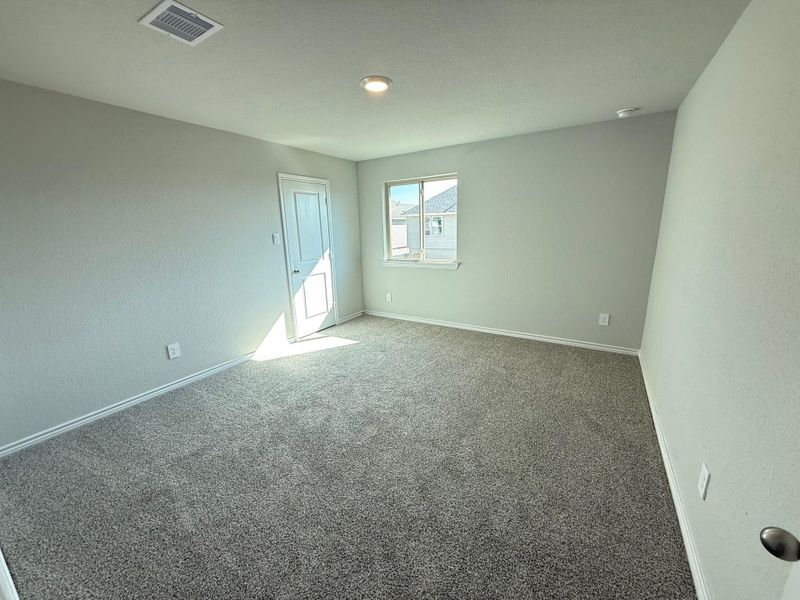 Spacious, unfurnished interior of a new home in Southern Pointe, College Station (Image 17).
